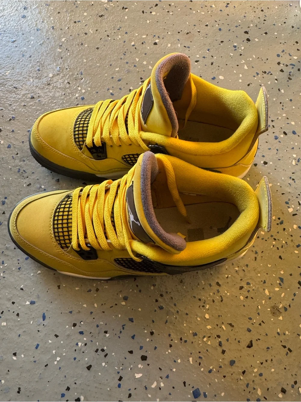 Jordan Yellow and Black Retro 4 Sneakers “Yellow Lightning”